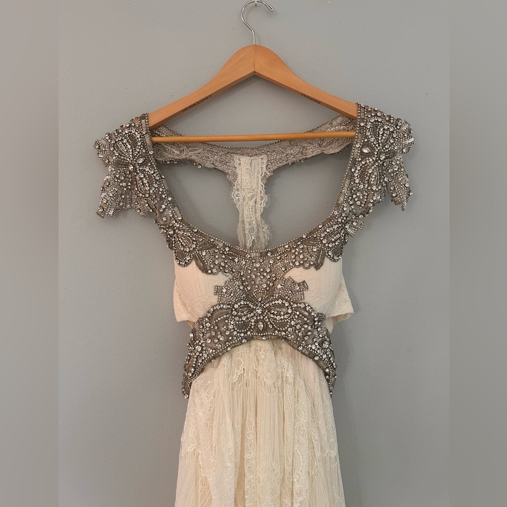 Elegant Cream and Silver Wedding Dress - Picture 2 of 5